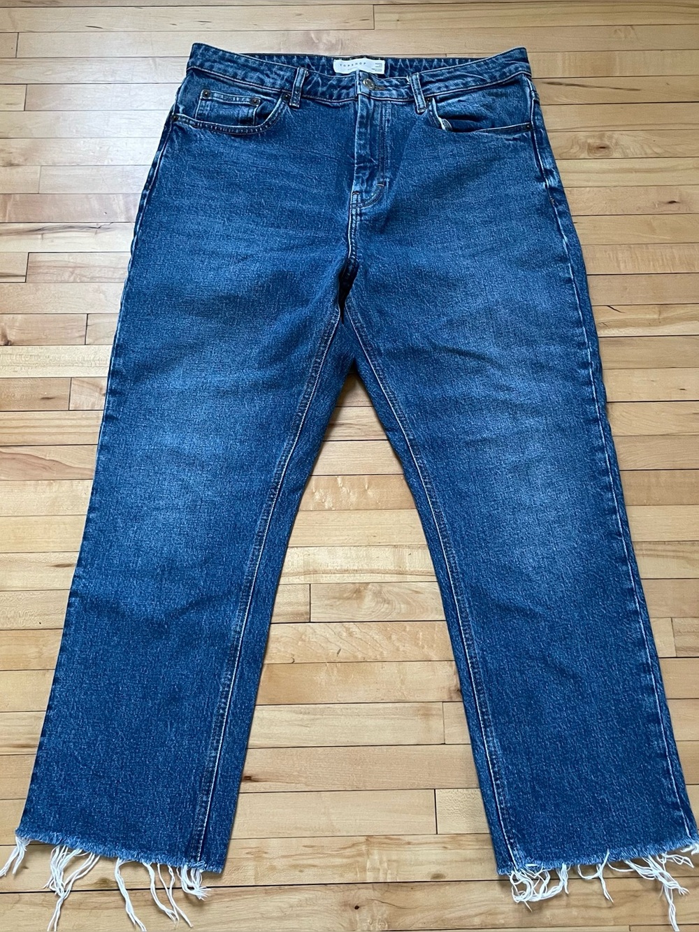 Topshop straight leg blue denim jeans with raw hem